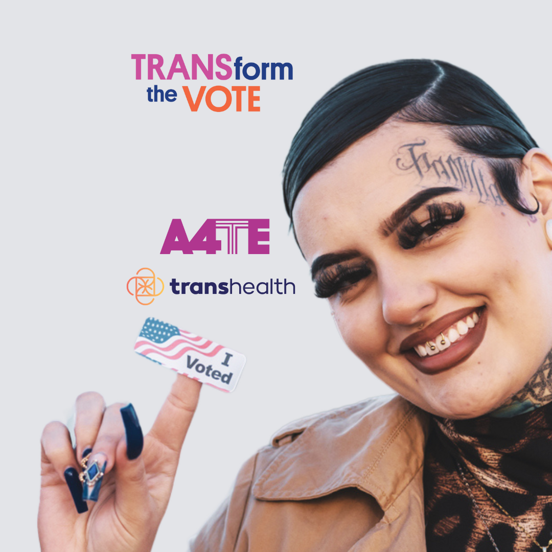A person with short dark hair and long fingernails smiling and holding an I Voted sticker.